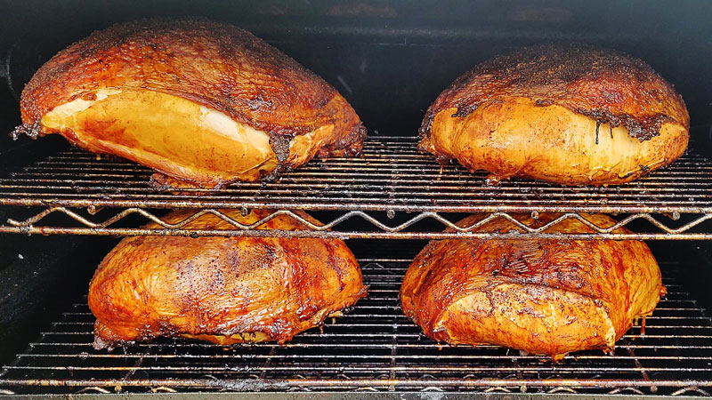 The smoker starts going at 8 am to get those turkey breasts just right.