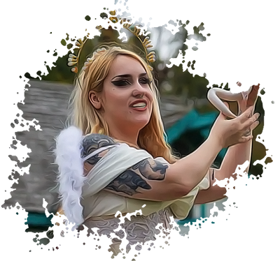 a woman poses in an elaborate angel costume