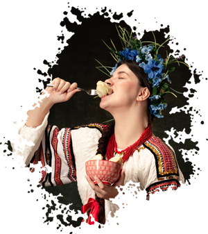 a woman wearing slavic inspired clothing eats from a bowl